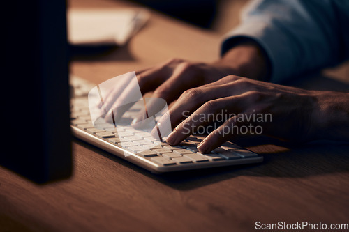 Image of Hands, man and keyboard on computer at night for planning, data analysis and pc internet. Closeup, typing and desktop technology of worker in dark office for seo research, website or business email