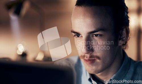 Image of Computer, night research or programmer man for cybersecurity, app coding or data analysis in office. Hacker, developer or employee on tech for software code, programming or startup analytics review