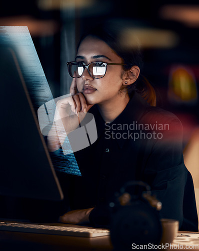 Image of Hologram, programming and thinking with woman at computer for software, idea and coding at night. Data analytics, technology and future with face of employee for media, database and cyber security