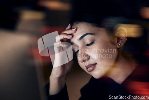 Image of Burnout, stress and business woman at night working on computer for project, report and strategy deadline. Headache, mental health and female worker in dark office frustrated, tired and overworked