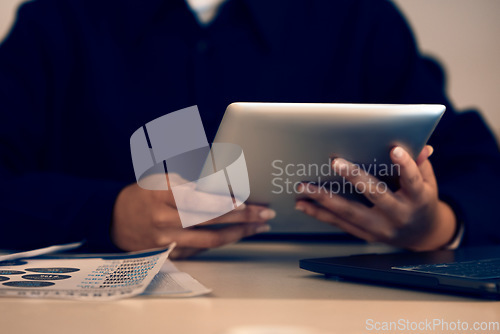 Image of Hands, business woman and typing on tablet in office, working on email or project online. Technology, social media and female professional writing reports, planning or internet research at night.