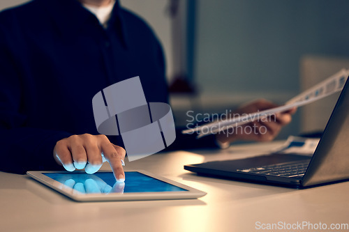 Image of Hand, tablet and laptop in night at office for research, analysis and web design at desk for tech innovation. Man, mobile touchscreen and iot with documents for goal, search and coding on website ui