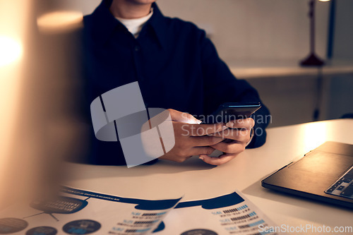 Image of Hands, business woman and phone in office for texting, web browsing or social media. Technology, cellphone and female employee with mobile smartphone for networking or internet scrolling at night.