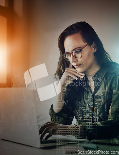 Image of Woman, laptop and thinking in night with overlay of city, metro or buildings at office for idea, IT or career goal. Web design expert, computer and brainstorming at desk with focus, innovation or seo