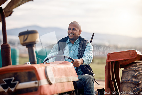 Image of Tractor, man and driver on field for agriculture, countryside or sustainability in nature. Happy farmer worker driving machine truck, transport and sustainable ecology with happiness of land harvest