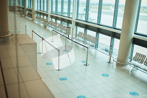 Image of Travel, empty and floor of an airport building with space, architecture and waiting room for a plane. Design, clean and terminal for a check in while traveling, tourism and corridor entrance