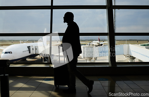 Image of Airport, travel or silhouette man walking to airplane, flight booking or transportation for world tour. Suitcase luggage, plane departure or profile person on holiday trip, vacation or global journey