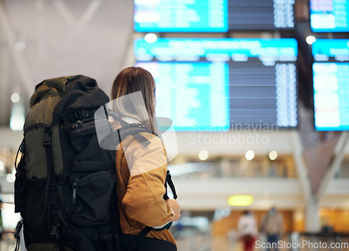 Image of Travel, backpack and woman in airport on a trip, vacation or holiday happy on an international journey to city. Airplane, excited and female happy traveling from an airline building to board flight