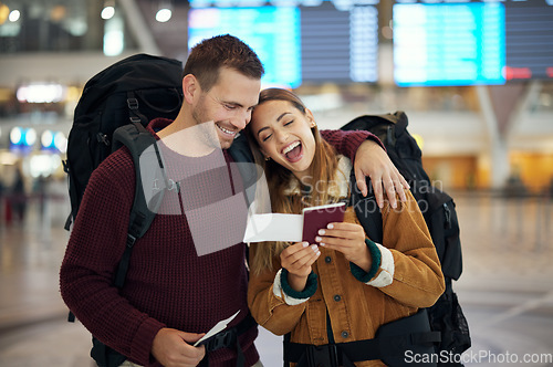 Image of Ticket, travel and couple at airport with passport talking, chatting or laughing at funny joke. Valentines day, comic and happy man and woman in airline lobby with flight documents and boarding pass.