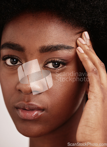 Image of Portrait, black woman or cosmetics for dermatology, beauty or salon treatment on grey studio background. Face detox, African American female or confident girl with makeup, morning routine or grooming