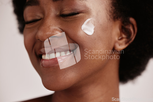 Image of Dermatology, face shine and cream of a model with facial mask, skincare and sunscreen in studio. Isolated, white background and self care treatment of a young person with cosmetic and collagen lotion