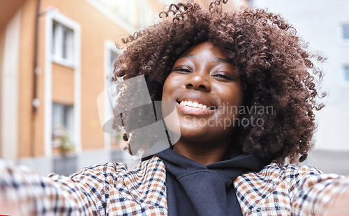 Image of Travel influencer, portrait or afro selfie in city, urban holiday or vacation on fashion, social media or live streaming blog. Smile, happy or black woman face in pov photography or profile picture