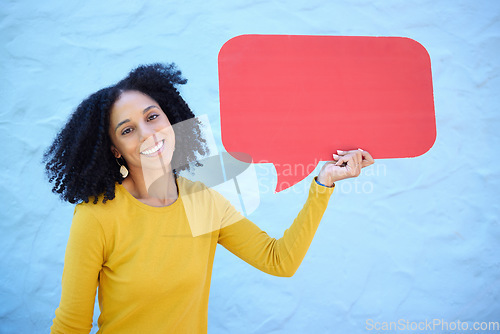 Image of Black woman, portrait and speech bubble in studio for advertising, mockup and space on blue background. Social media, girl and billboard, branding and copy for product placement and marketing