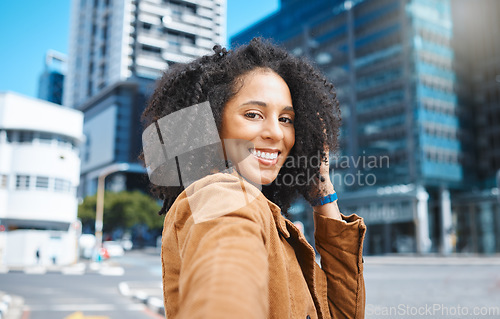 Image of Selfie, urban city and black woman for travel, fashion influencer or portrait update of her journey in street. Walking, USA New York and happy face of young person in road with natural hair or afro