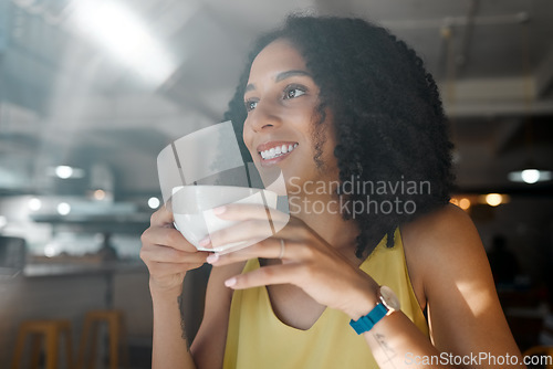 Image of Morning cup of tea, black woman and coffee shop thinking with a young person in a restaurant. Cafe, sitting and happy African female with a hot drink enjoying a day with happiness and an idea