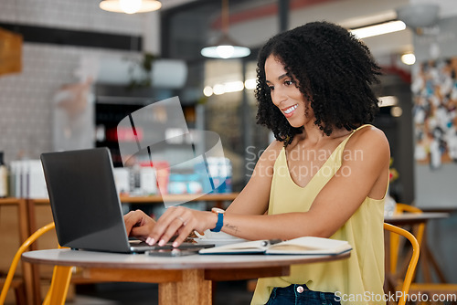 Image of Freelance, laptop or typing in coffee shop, cafe or restaurant on internet blog, student research or startup planning. Smile, happy or creative black woman on remote work technology in small business