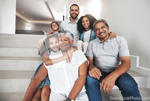Image of Love, stairs and group portrait of happy family bonding, hug and enjoy quality time together in their house. Holiday smile, happiness and relax children, parents and grandparents in vacation home