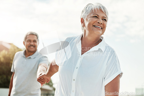 Image of Senior couple holding hands in park for outdoor wellness, happy retirement and valentines love in Mexico. Mexican elderly woman with her partner walking together for nature support, care and fun