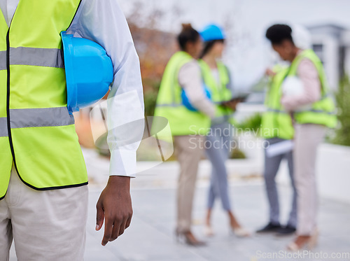 Image of Construction worker team, man and helmet in mockup with planning vision, strategy or blueprint for property. Architect group, black woman and men with tablet, safety and collaboration for development