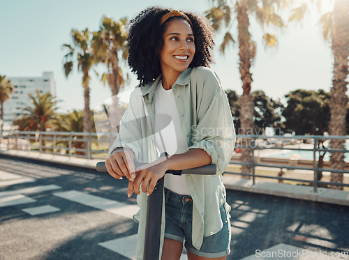 Image of Black woman, scooter and sustainable travel in city, adventure and sunshine with happiness outdoor. Eco friendly transportation, freedom with carbon footprint and transport in urban street in Miami