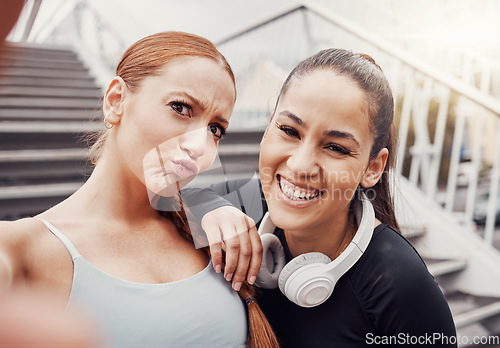 Image of Fitness, portrait or friends in a happy selfie in training, exercise or workout in city with headphones. Runners, sports women or funny girls in partnership in a photo for social media app laughing