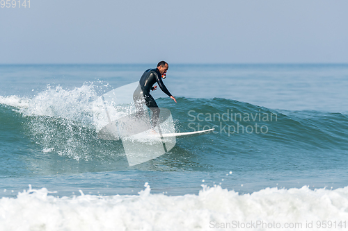 Image of Surfing the waves