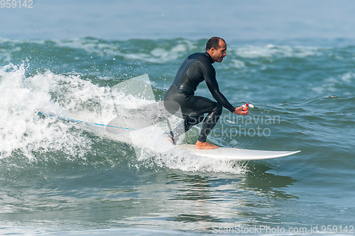 Image of Surfing the waves