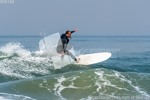 Image of Surfing the waves