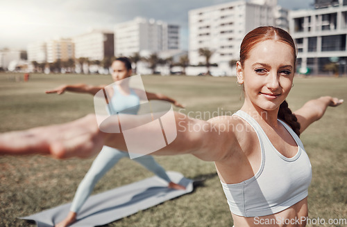 Image of Pilates, fitness and wellness with woman friends in the park together for mental health exercise. Yoga, zen or training with a female yogi and friend outside on a grass field for a summer workout