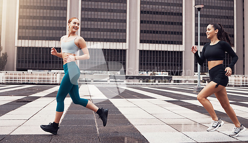 Image of Women run in city, fitness and cardio outdoor with exercise friends and active lifestyle together. Sport, health with wellness and training, athlete running race with healthy people in California