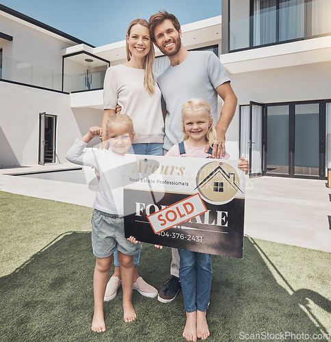 Image of Real estate, sign and portrait of family with keys moving advertisement, property and homeowner. Happy, showing and parents with children, board and relocation after buying a new home from realtor
