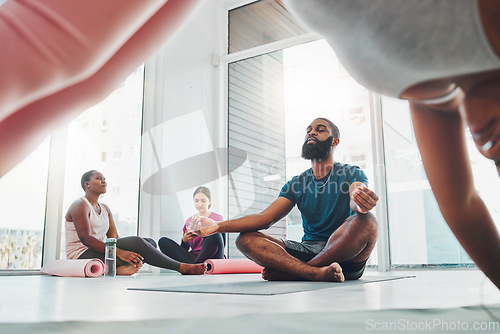 Image of Black man, yoga and meditation with lotus exercise for fitness, peace and wellness in class. Young male person in gym studio for holistic workout, mental health and body balance with zen energy