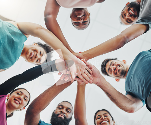 Image of Fitness group, hands of people portrait from bottom together with united teamwork and happiness. Motivation, circle and exercise support of training team with solidarity, trust and goal celebration