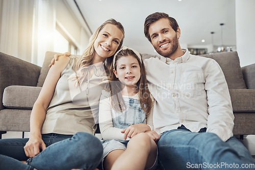 Image of Portrait, mother or father with a kid to relax as a happy family in living room bonding in Australia with love or care. Hugging, trust or parent smile with girl enjoying quality time on a fun holiday