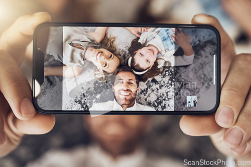 Image of Portrait, phone or parents with a girl on a selfie screen as a happy family on living room carpet in Australia. Mother, father or child relaxing with a smile love bonding time or taking pictures