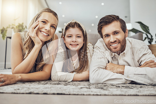 Image of Portrait, mother or father with a girl on floor relaxing as a happy family bonding in Australia with love or care. Carpet, trust or parents smile with kid enjoying quality time on a fun holiday