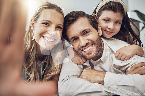 Image of Portrait, love or parents take a selfie with a girl as a happy family in house living room bonding in Australia. Mother, father or child relaxing with a smile enjoying quality time or taking pictures