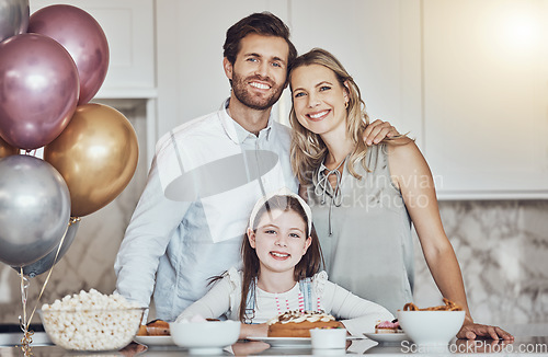 Image of Portrait, family or girl in celebration of a happy birthday in a house party or kitchen with a smile popcorn or cake. Mother, dad or child bonding or hugging with love at home to celebrate together