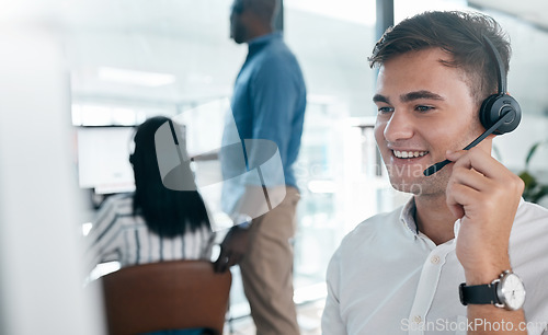 Image of Call center worker, call and crm business man conversation at a computer working on support call. Telemarketing, company networking and contact us consultant on a digital consultation for tech help