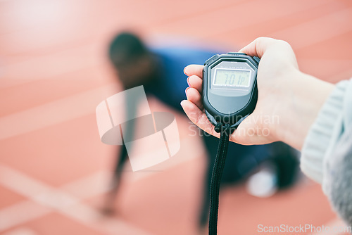 Image of Sports, running and hands with stop watch on race track for exercise, marathon training and fitness. Stadium, workout and athlete team with timer for performance, lap speed and racing competition