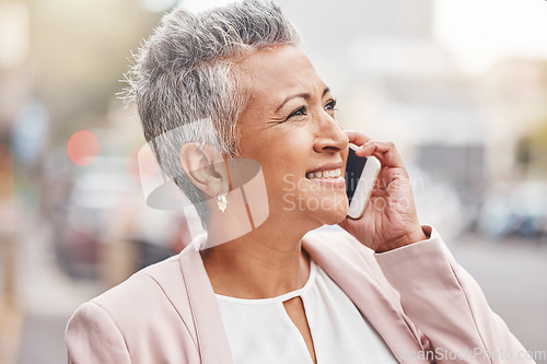 Image of Senior woman, phone call and smile in the city for communication, conversation or discussion. Happy elderly female smiling on smartphone for 5G connection, talking or networking in an urban town