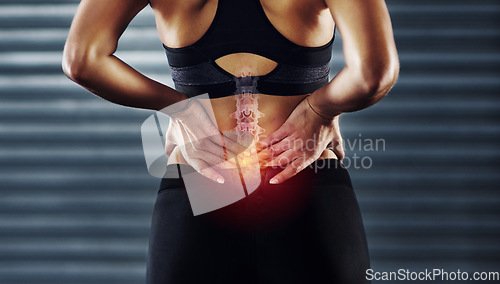 Image of Woman with back pain, sport injury and fitness, spine x ray and anatomy with red overlay, medical problem and health. Healthcare emergency, inflammation and muscle tension with exercise in gym