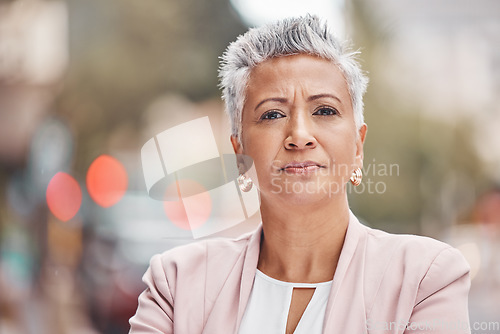 Image of Portrait, business and old woman outdoor, serious and confident leader, urban and skills. Face, female manager and entrepreneur outside, assertive and plan for sales growth, ceo in city and formal