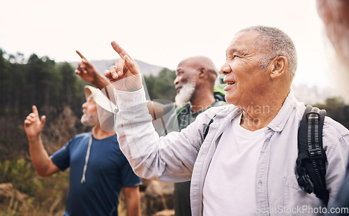 Image of Hiking, old men and pointing with view, nature and reunion on summer vacation, bonding and conversation. Hikers, mature males and senior friends on getaway outdoor, quality time and talking on trip