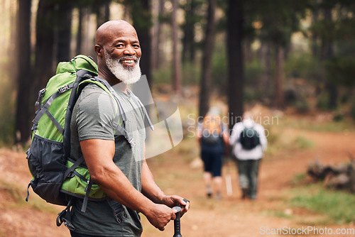 Image of Portrait, black man and hiking in forest, exercise and fitness for wellness, healthy lifestyle and smile. Face, senior male and mature gentleman with backpack, smile and hiker in woods and fresh air