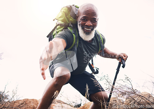 Image of Hiking, help and portrait of senior man reaching hand during hike, fitness and cardio in nature on light background. Helping, hands and face of elderly guy offering support while trekking in a forest