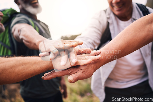 Image of Hiking, sports and hands of people stack for support, motivation and fitness in outdoor forest. Teamwork, diversity and group of hikers for exercise, trekking and cardio workout in woods for wellness