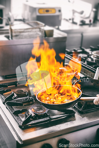 Image of Chef is making flambe sauce