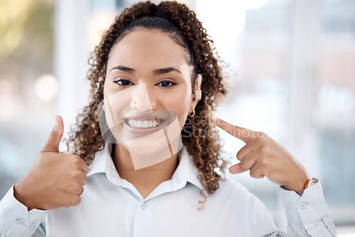 Image of Black woman, portrait smile and thumbs up for hearing aid, auditory treatment or audiologist at clinic. Happy African American female smiling showing hand thumb emoji for listening success or thanks