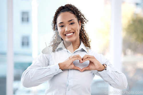 Image of Black woman, hands and portrait with heart emoji for love, charity and support with a happy smile. Face of business person with shape for care, valentines day and hope or sign for review and feedback